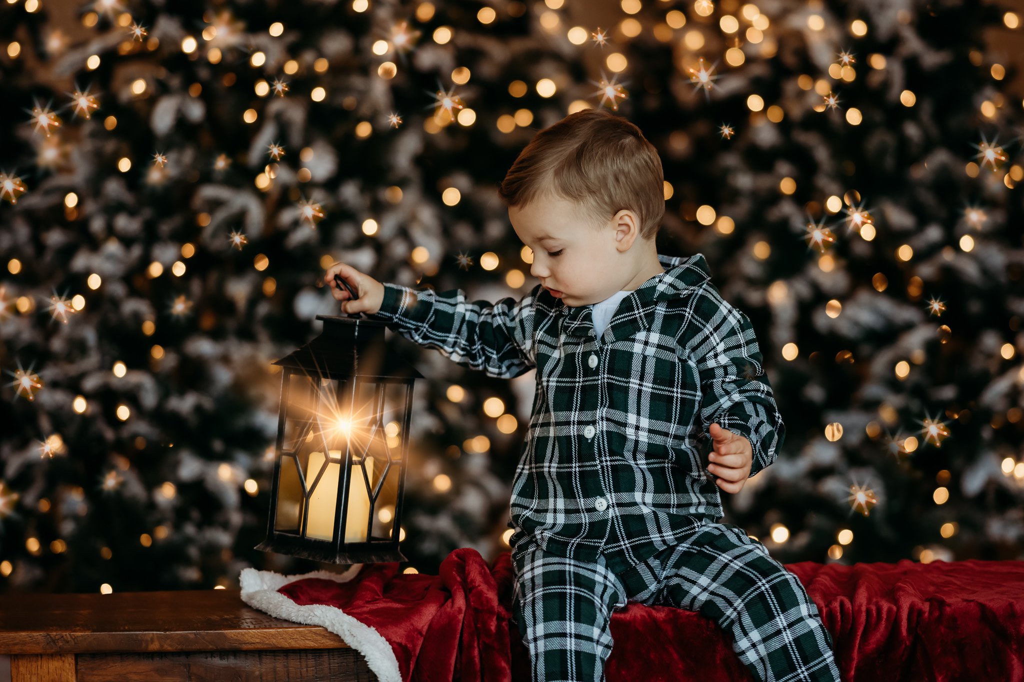 Christmas boy holding lantern